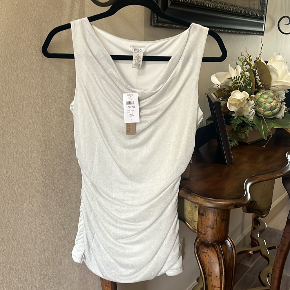 Cache women’s sleeveless dressy top 
Brand new with tags 
XS